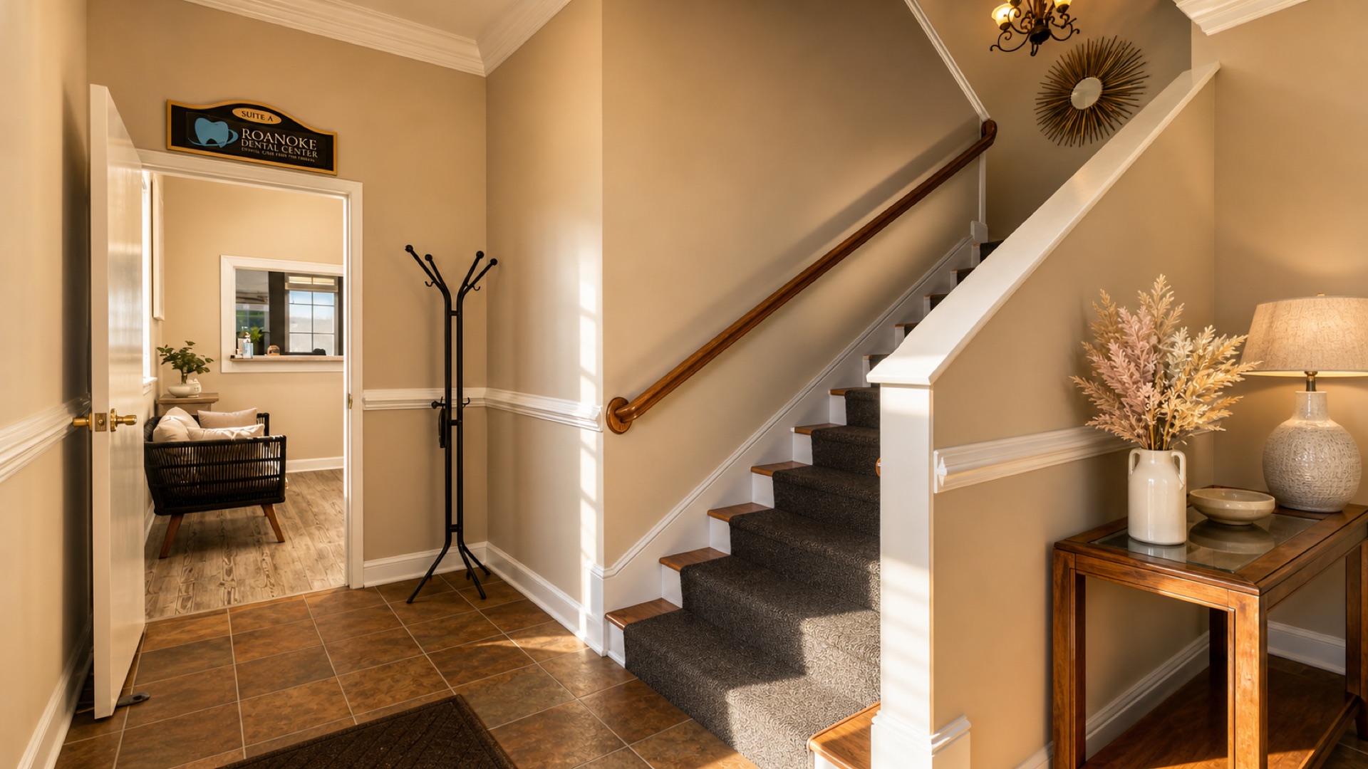 Entryway and staircase inside the Roanoke Dental Center Electric Rd office, with patient seating visible through the door